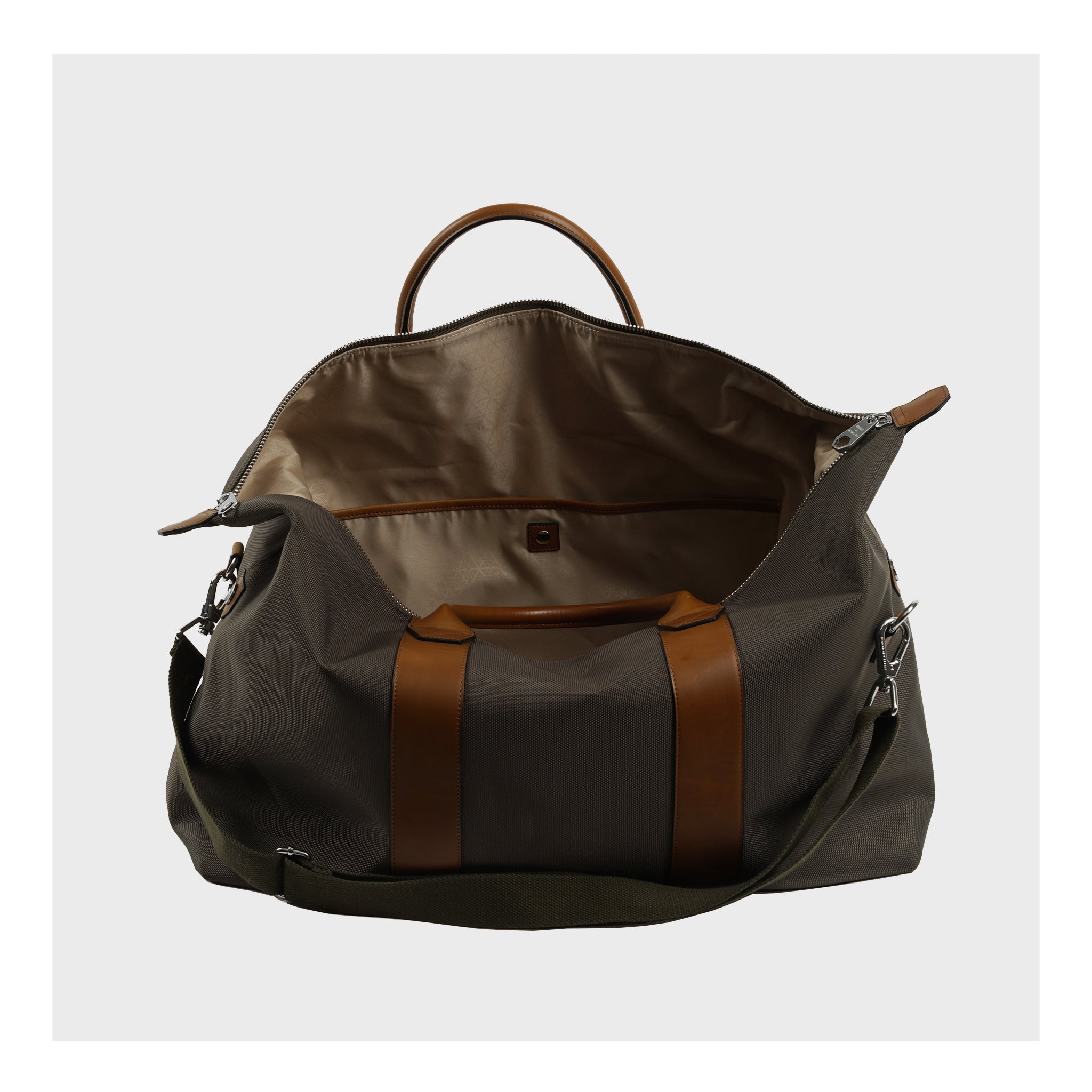 "Frontal view of the spacious Steele & Borough Weekender Bag."