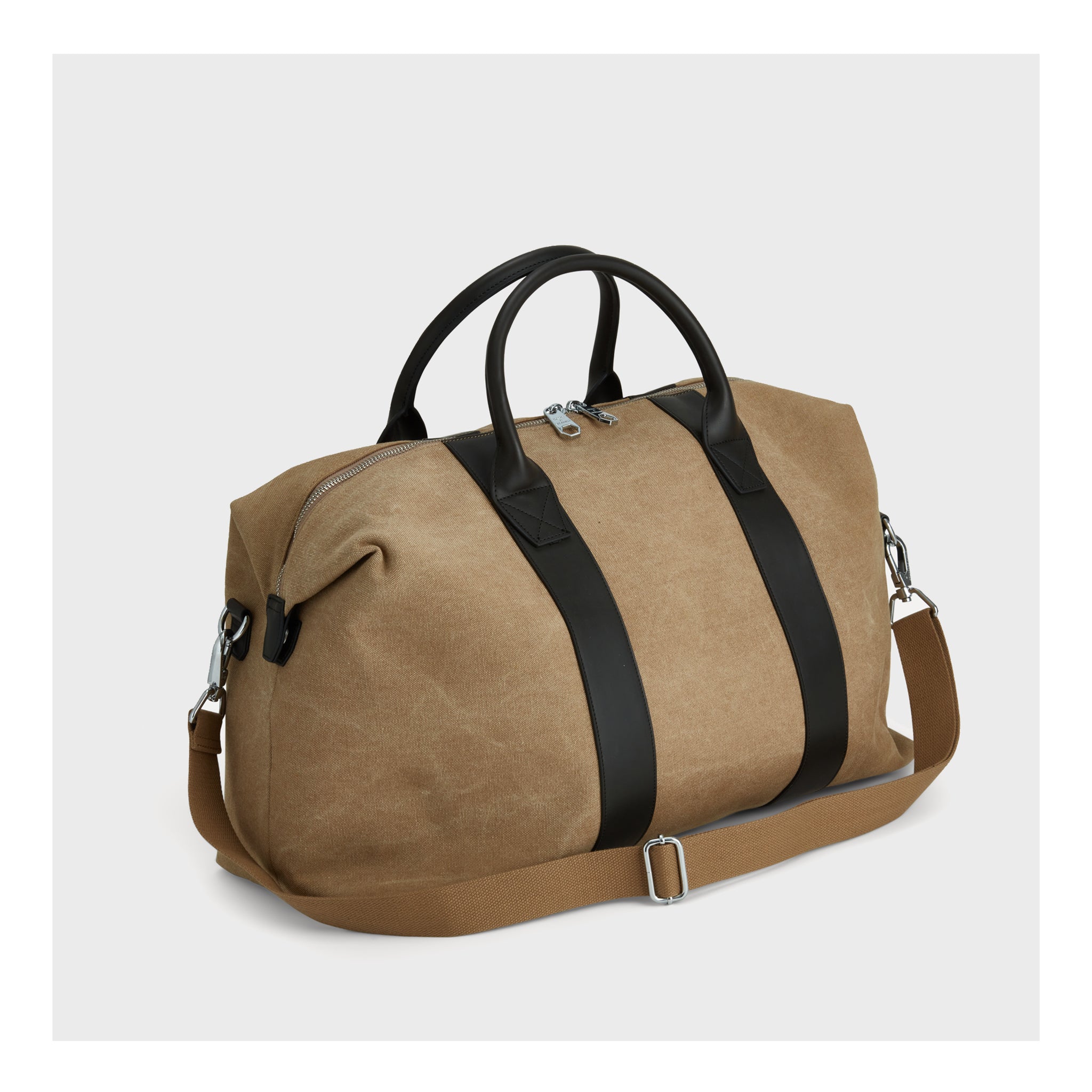 Angled perspective of the Khaki Overnight Bag, showcasing the quality material and functional design