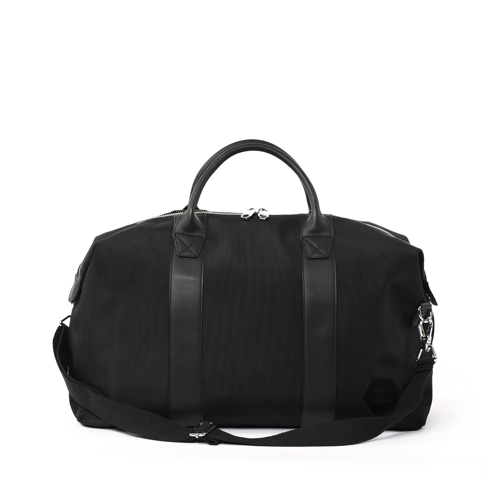 Elegant black Weekend Bag on a white background, showcasing the classic design and portability