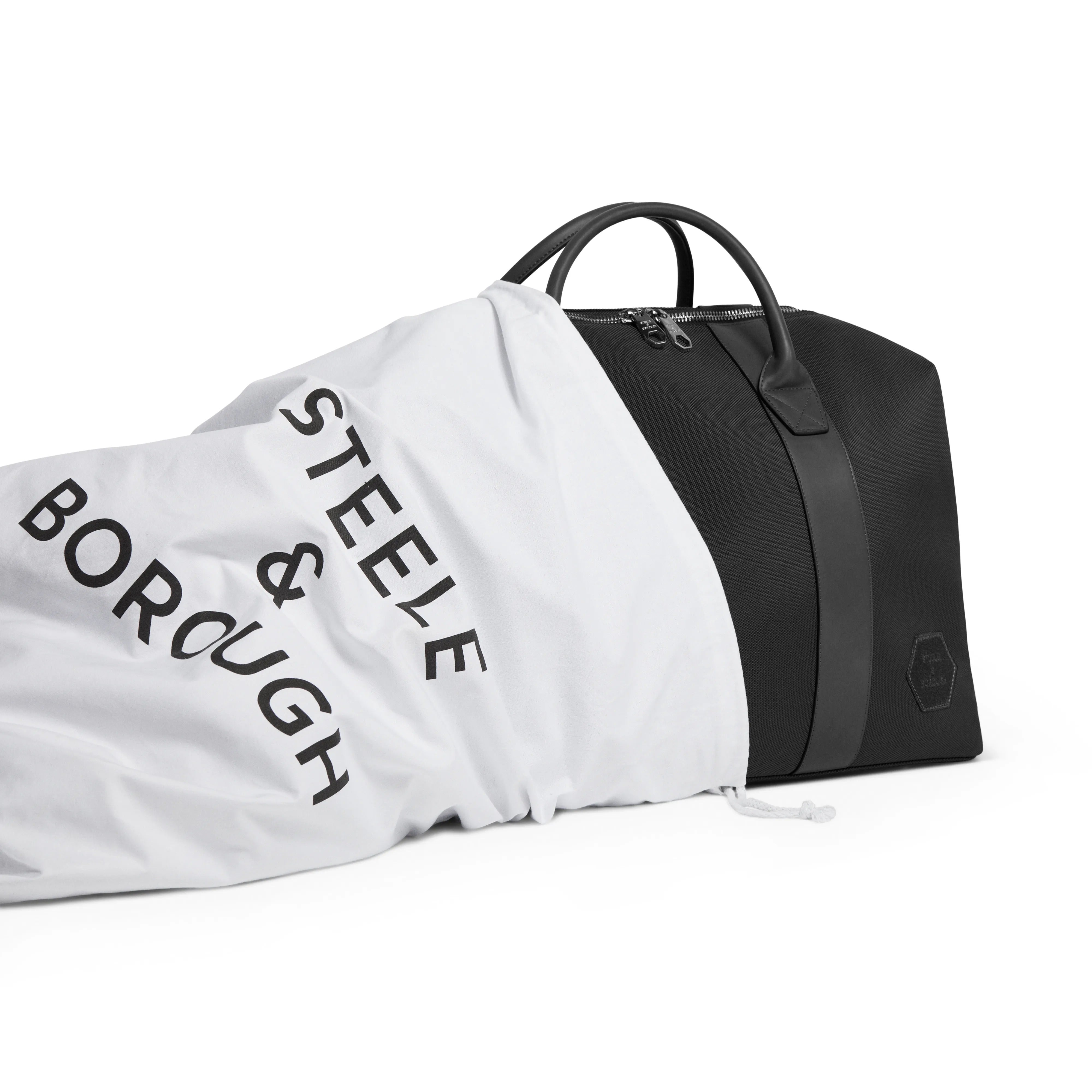 Black Weekend Bag paired with a chic white protective dust bag, showcasing the product's luxury and care instructions
